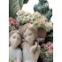Статуэтка "Секретничая в парке" Lladro 01008506